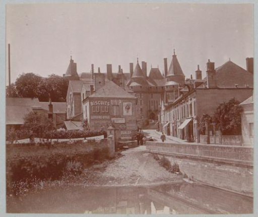 View of houses, towers, and billboards, probably in Saumur