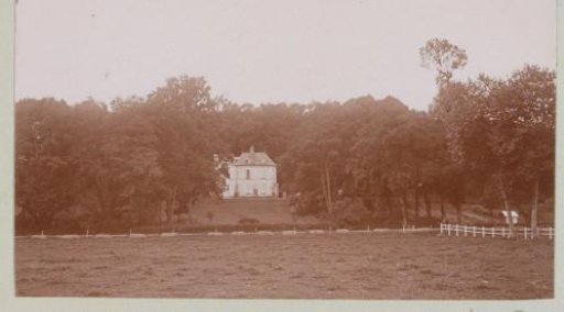 View of a country house in a wooded area, probably in Italy or France