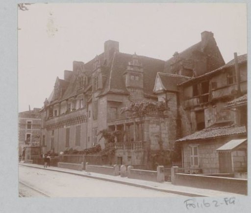 Exterior of a town villa and old houses, probably in a town on the Loire