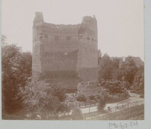 Exterior of a dilapidated tower, probably in a town on the Loire
