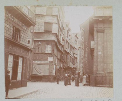 Street with Shops and Passersby in France