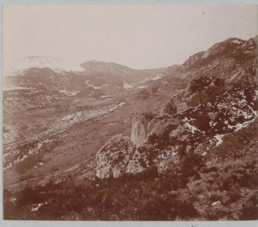 Mountain landscape with snow-capped peaks, presumably in Southern France