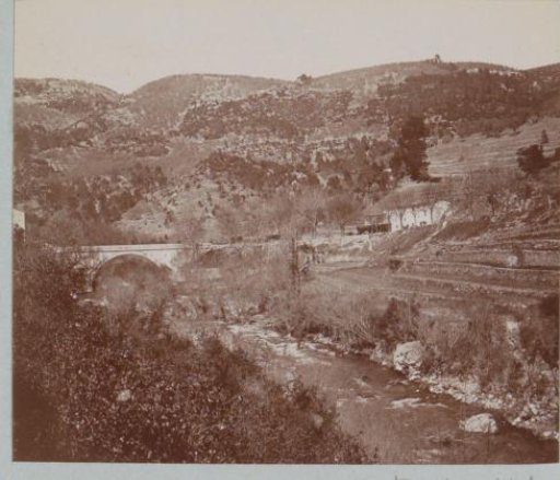 Landscape with a stream and a bridge, presumably in Southern France