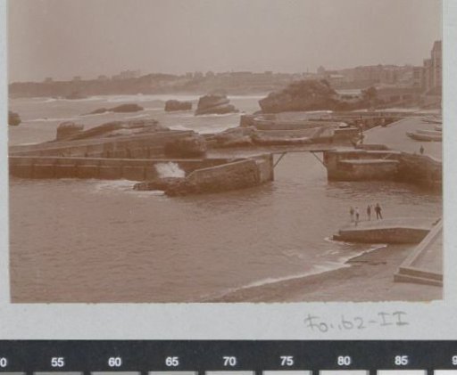 View of a harbor at sea, probably on the French coast