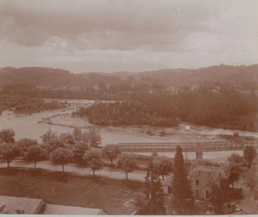 River landscape with a railway bridge, probably in France
