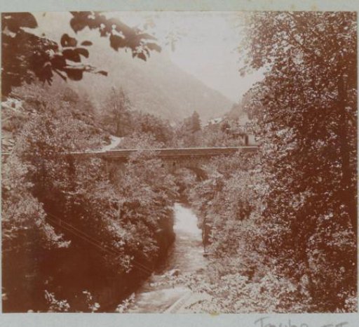 Stone bridge over a stream, probably in France