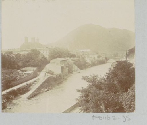 View of Foix with a castle on the left