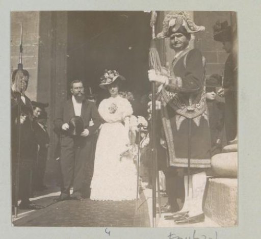 Wedding guests leaving a building, probably in Italy or France
