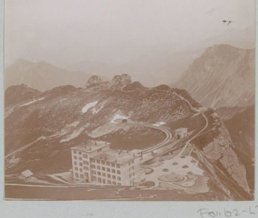 Mountain landscape with the Grand Hotel Rochers de Naye, railway and paths in the Swiss Alps