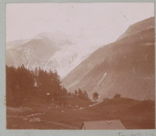 Mountain landscape with snow-capped peaks and steep mountain slopes in the Alps