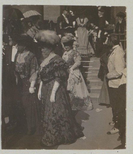Wedding guests leaving a building, probably in Italy or France