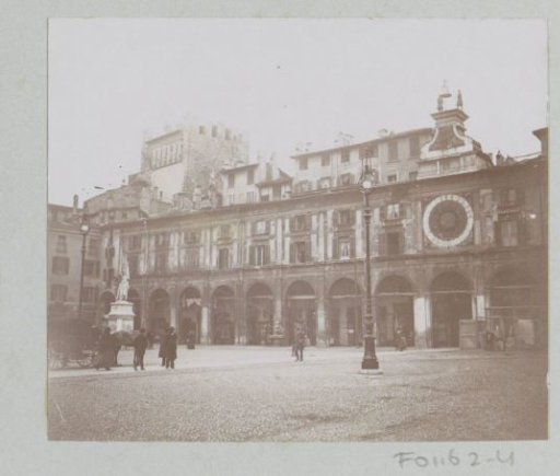 Piazza del Mercato in Brescia with the clock tower (Torre dell'Orologio) on the right