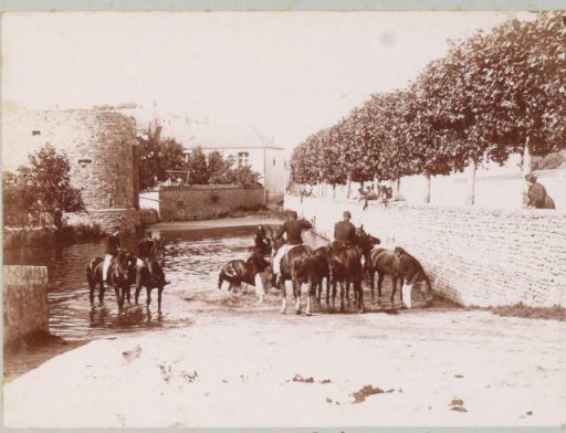 Soldiers on horseback at a watering place in Puiseaux