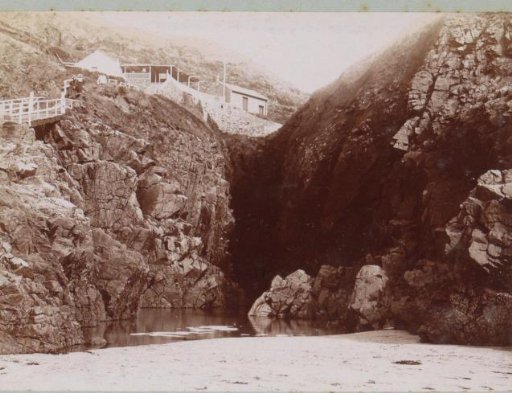 View of Houses and the Grotto of Plemont on Jersey