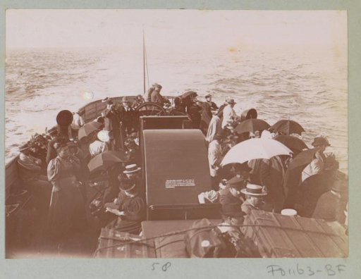 People on the deck of a ship near Saint-Malo