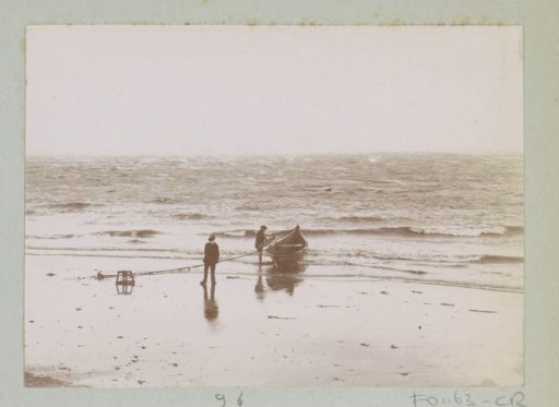 Two persons with a boat on the beach, presumably off Le Moulleau near Arcachon