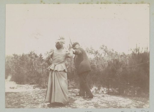 Man and woman, probably dancing on a path near Arcachon