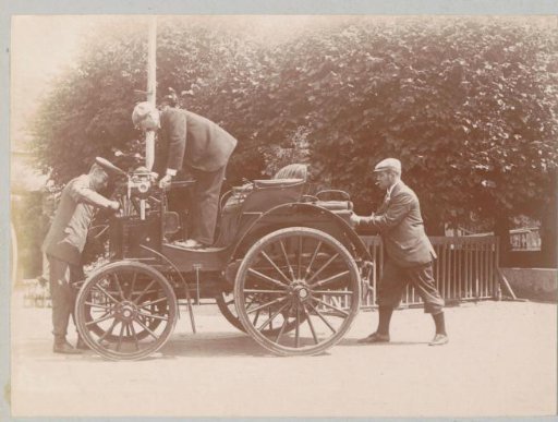 Three men with an automobile at Varaville
