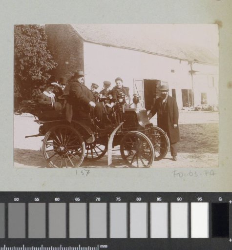 Group with an automobile, possibly at L'Isle-Adam