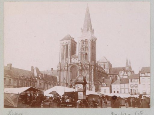 Market in Lisieux with the cathedral in the background