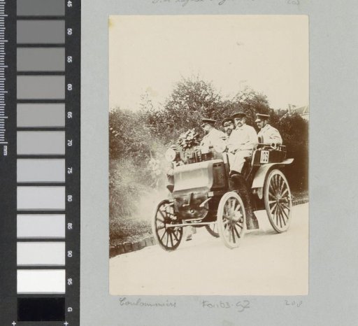Participants in the Paris-Amsterdam automobile race on the road at Coulommiers