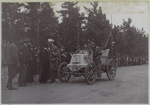 Fernand Charron, one of the participants in (and later winner of) the Paris-Amsterdam race, in his automobile on the road