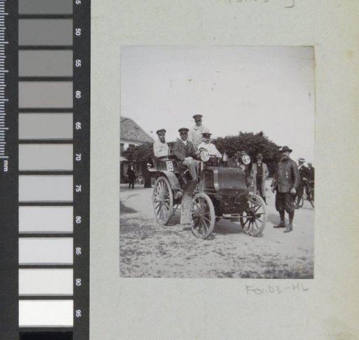 Participants in the Paris-Amsterdam race in their automobile, presumably in the Nijmegen region