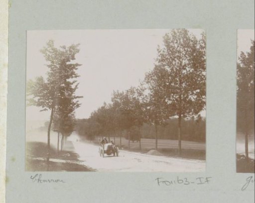 Race car driver Charron, participant in the Tour de France for motor cars, on a country road in Vitry-le-François