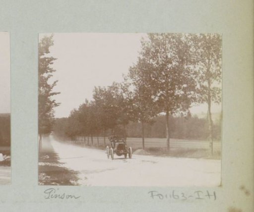 Race car driver Pinson, participant in the Tour de France for motor cars, on a country road in Vitry-le-François