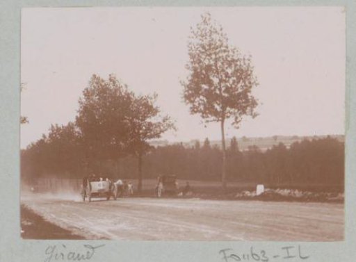 Race car driver Giraud, participant in the Tour de France for motor cars, on a country road in Vitry-le-François
