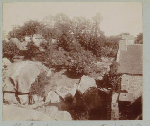 Houses near rock formations in Huelgoat