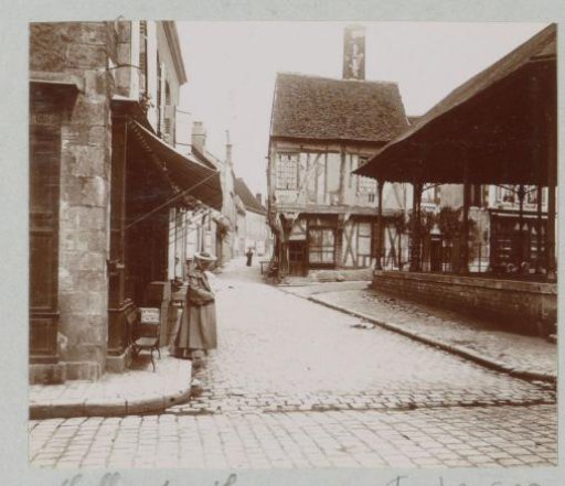 Woman on a square in Sully-sur-Loire