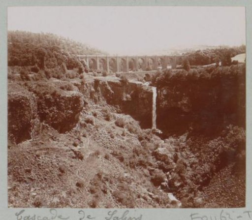 View of the waterfall and viaduct of Salins