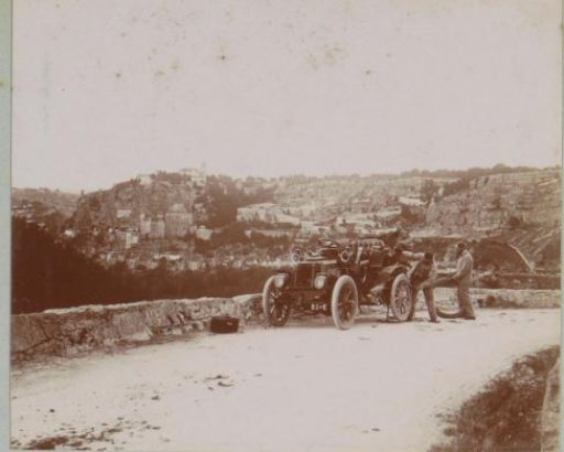 Tire change of an automobile on a road near Rocamadour