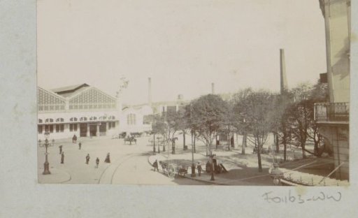 Square with a station, probably in a French town