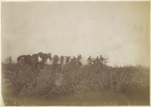 Soldiers, Horses, and Cannons Enshrouded in Smoke in France