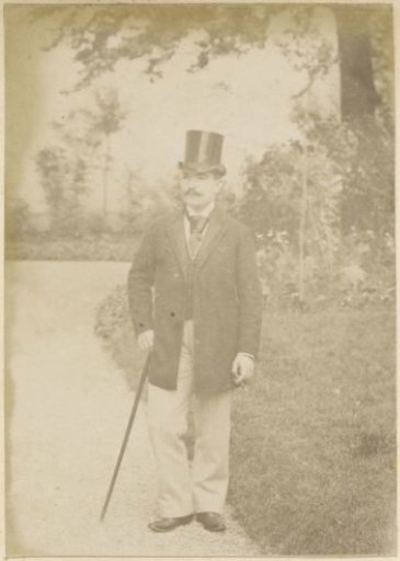 Portrait of a French man with a tall hat, a walking stick and a cigar, standing