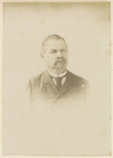 Portrait of a French man with a sideburn and a moustache