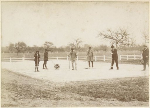 Group preparing a tennis court for use in France
