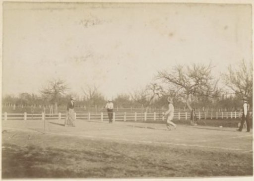Tennis match in doubles on a court in France