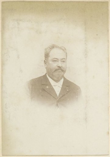 Portrait of a French man with a beard and moustache