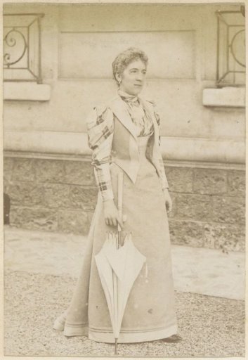 Portrait of a French woman with an umbrella