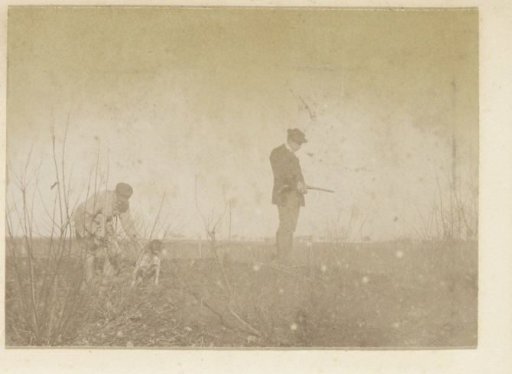 Two hunters and a dog in France