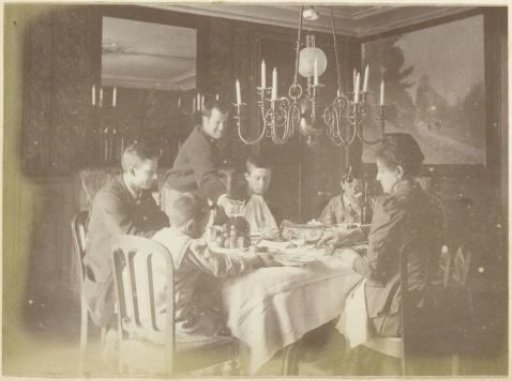Company dining in a dining room in France