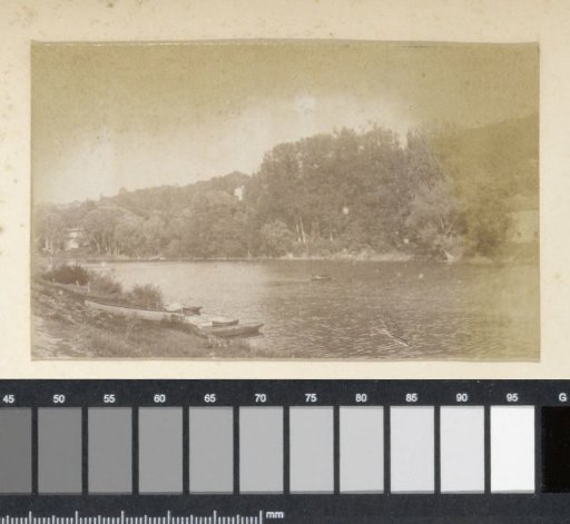 River landscape in France with a rowing boat landing stage in the foreground