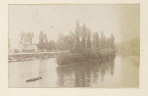 River landscape in France with a rowing boat in the foreground