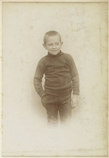 Portrait of a French boy, one hand in his pocket
