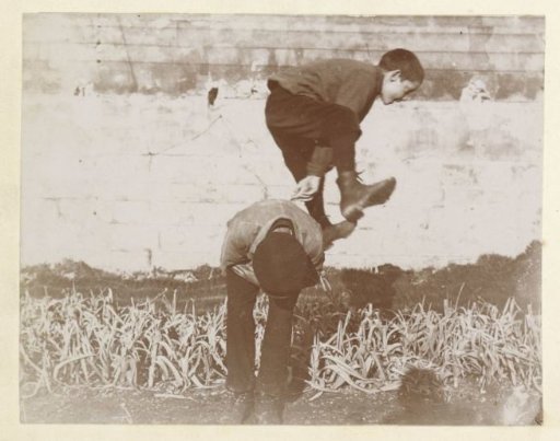 French boys playing 'tag' (hopscotch)