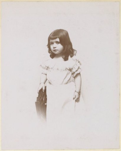 Portrait of a French child with shoulder-length hair