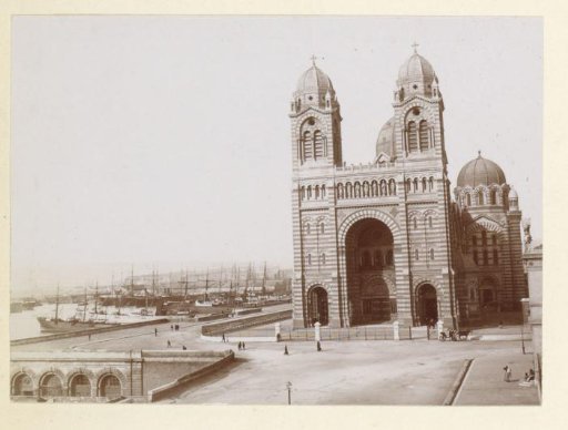 Exterior of the Cathédrale de la Major in Marseille with the harbor on the left